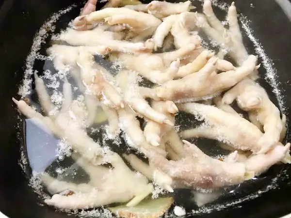 you should fish out the chicken feet