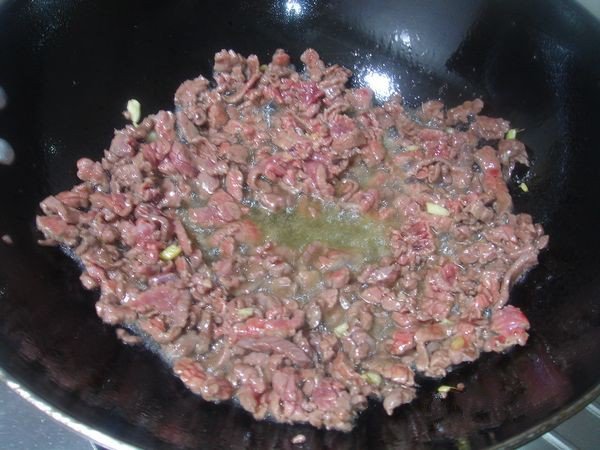 Cook the ginger for about a minute before adding onions. cook until golden brown