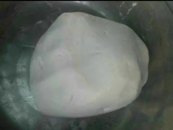Let it absorb water evenly and then knead it into a dough slowly by hand