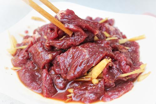 marinating the beef in the main elements save for the starch