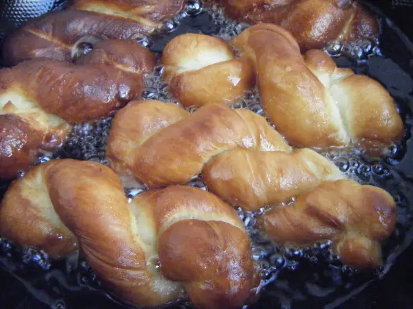 Until the oil temperature rises to about 160 degrees